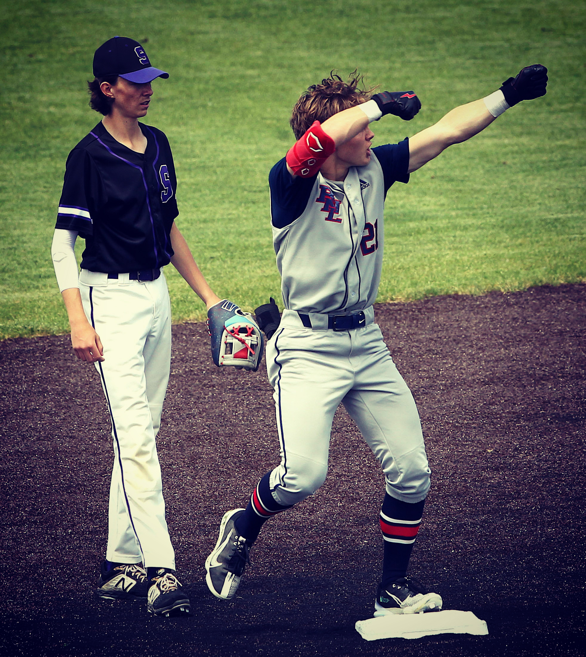 Bedford North Lawrence`s Cal Gates (21) celebrates BNL`s first run during the sectional semi-final game with Seymour on Saturday, May 28, 2022 at Jennings County.