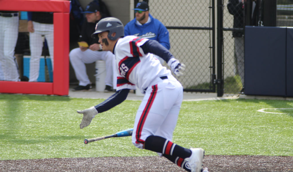 BNL’s Kline Woodward follows the flight of the baseball after connecting for a hit against Franklin.